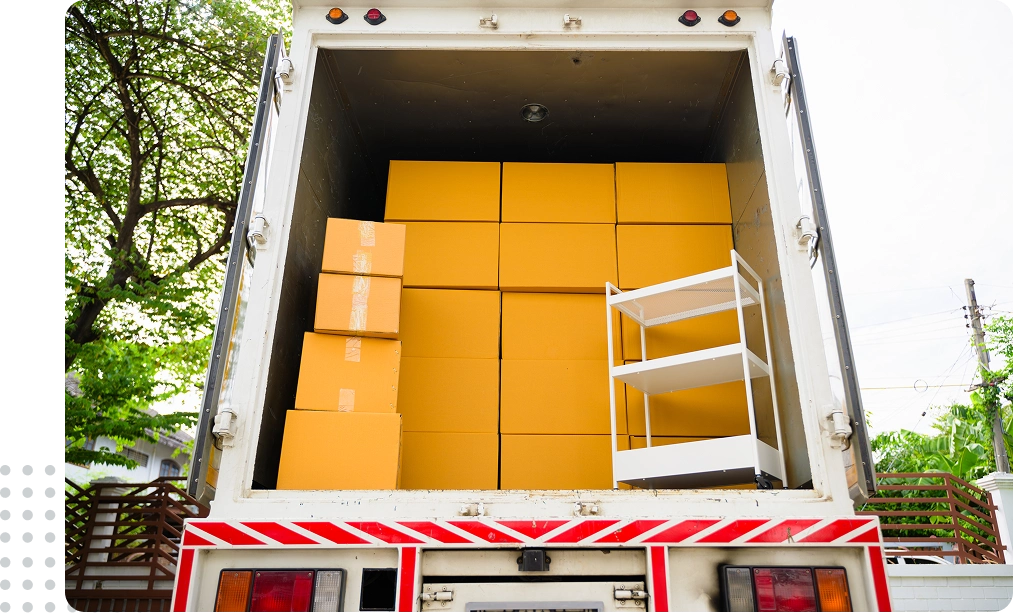Moving truck loaded with boxes and shelves.